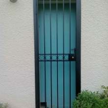 porte-grille-entrée-acier-forgé