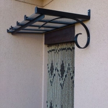 marquise-volute-fer-forgé